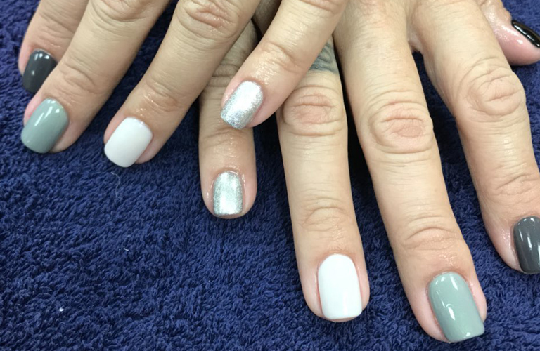 Glossy red manicure at DG Pretty Nails in Key West